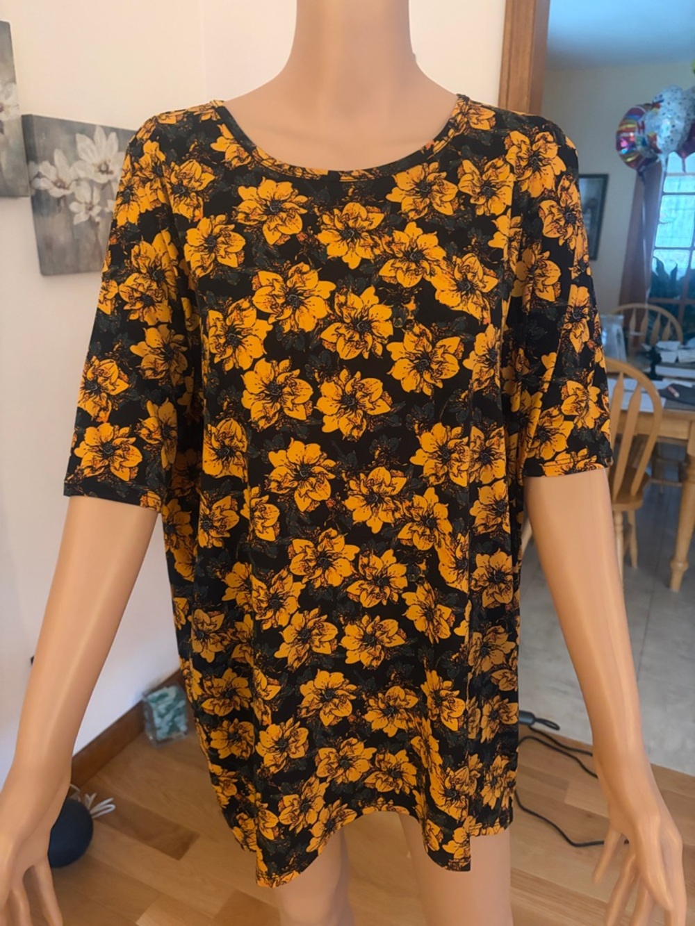 LuLaRoe Black Top with Bold Yellow Floral Print
